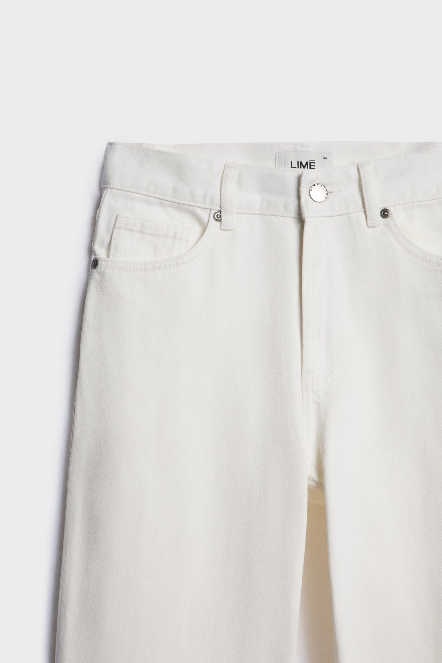 MID-WAIST RELAXED FIT JEANS