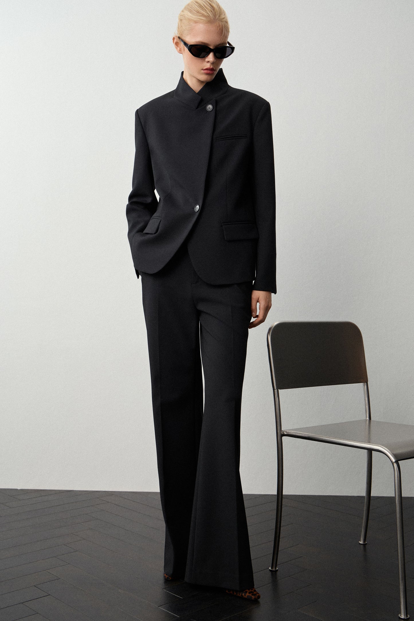 CREASED FLARE TROUSERS