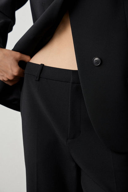 CREASED FLARE TROUSERS
